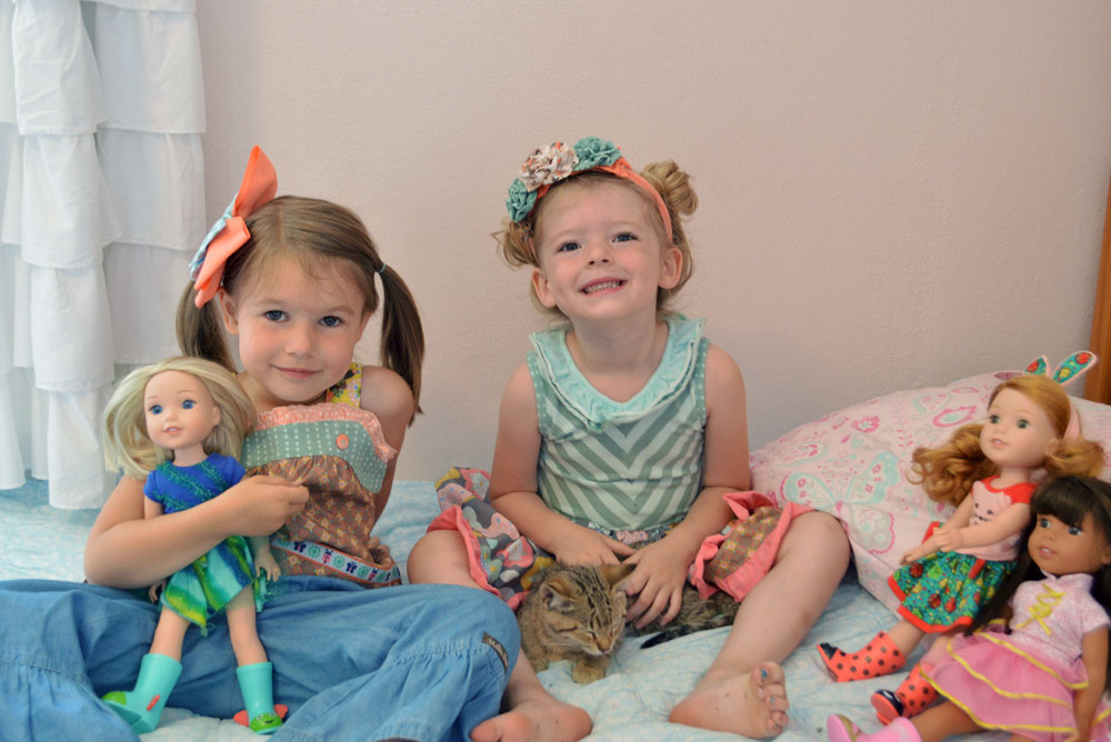Every girl needs a Matilda Jane dress, a fuzzy kitten, and a WellieWishers American Girl doll