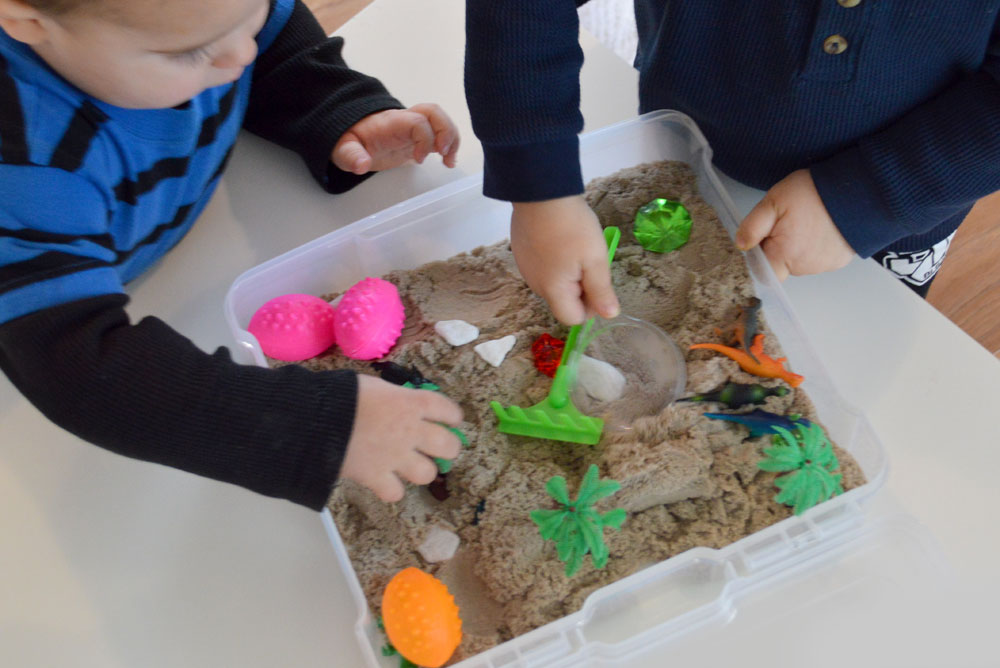 Dinosaur themed sensory bin for kids