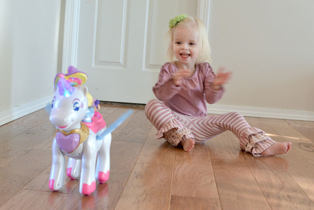 Little girl wearing Matilda Jane and Vtech Twinkle the Magical Unicorn - Mommy Scene