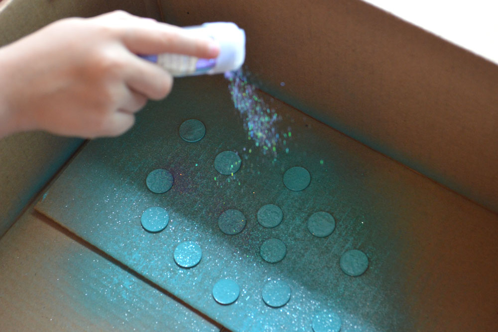 Spray old coins with glitter to make Tooth Fairy Coins! - Mommy Scene
