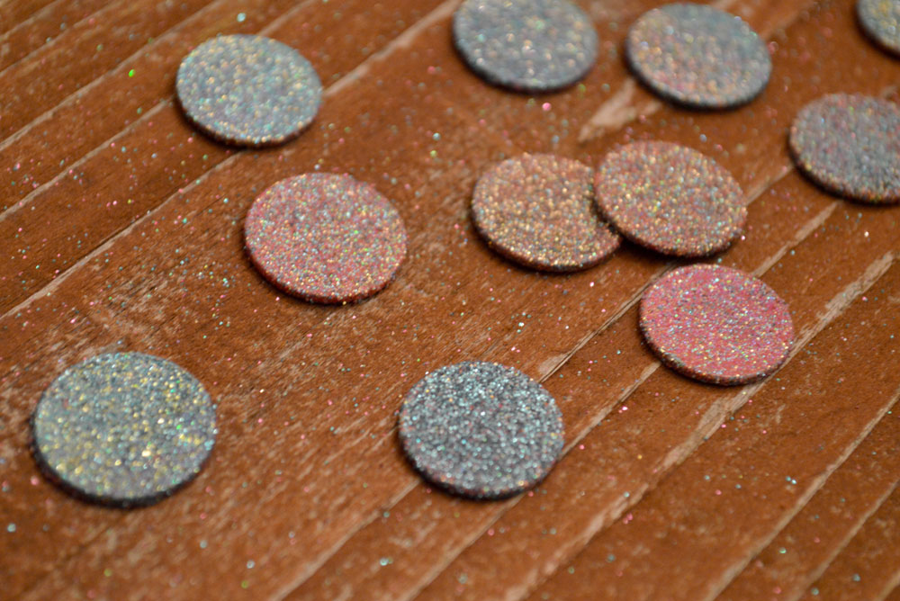 Glittery DIY tooth fairy coins make losing a tooth fun!