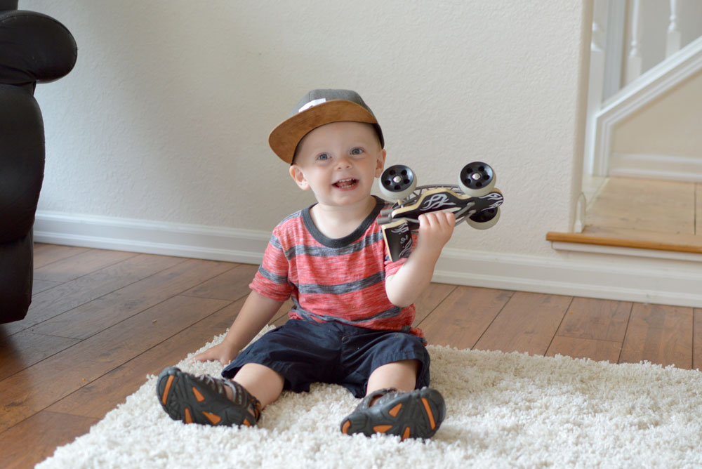 Baby Cubby hape toys bamboo race car and Jack & Winn baby boy hat