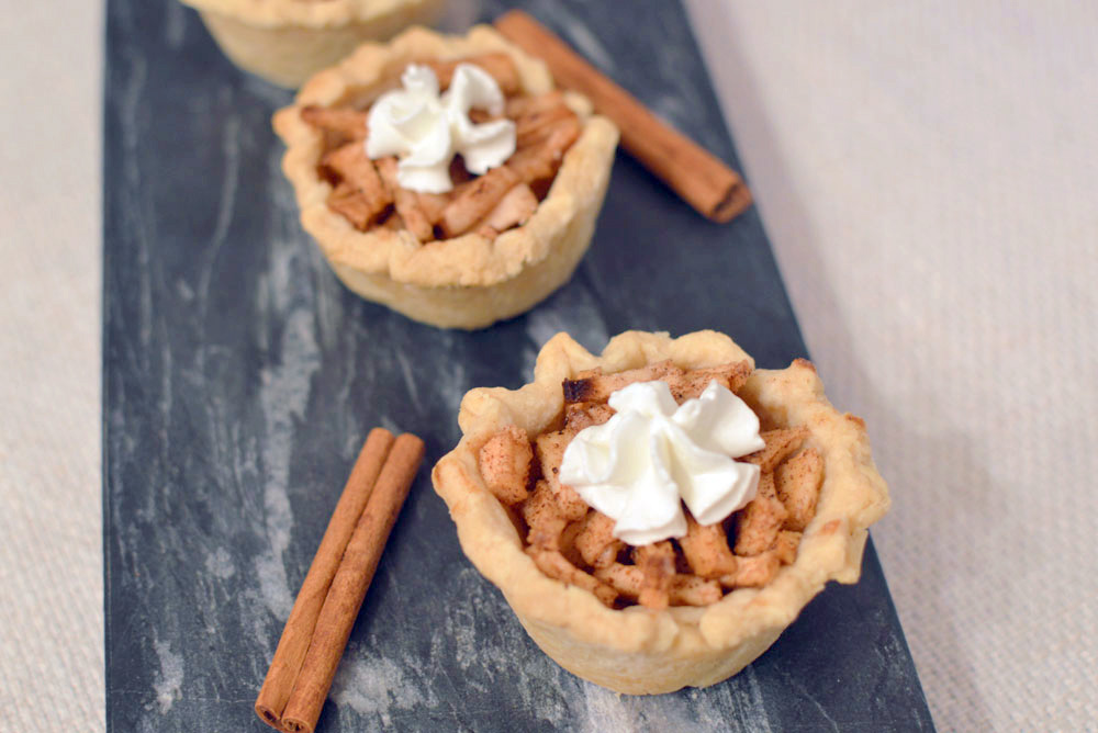 Bite-Sized Mini Apple Pies baked in a muffin tin - Mommy Scene