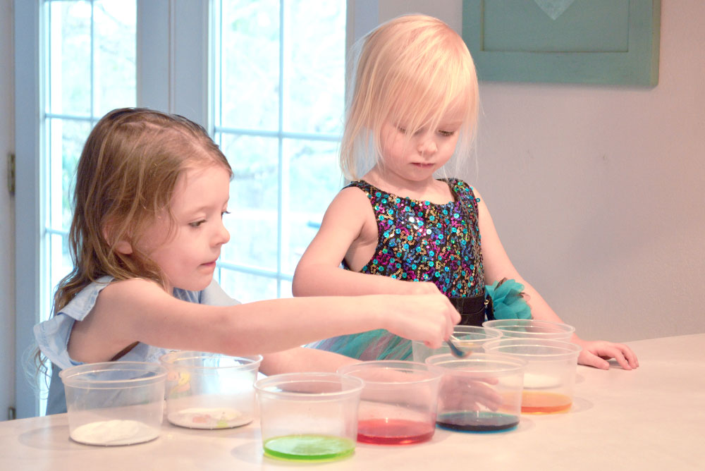 Baking soda and vinegar color science activity for kids