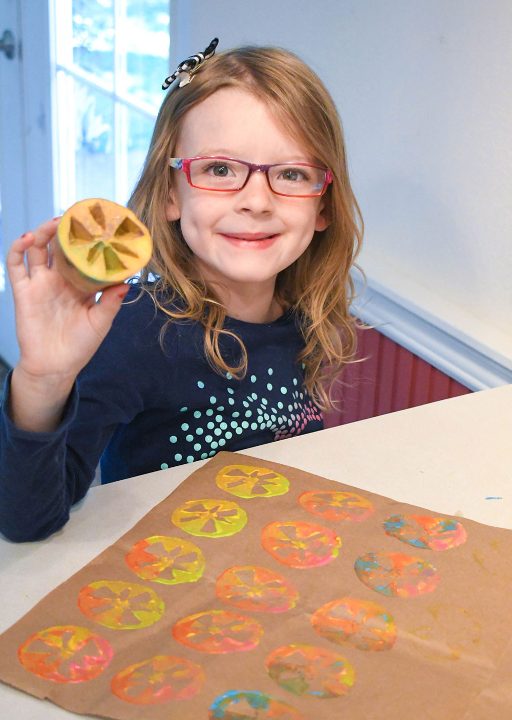 Make your own designs with colorful potato stamps!