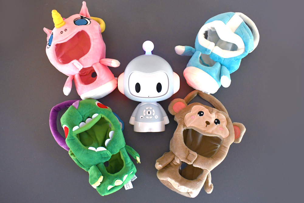 Codi storytelling robot has Dinosaur, Unicorn and Monkey outfits
