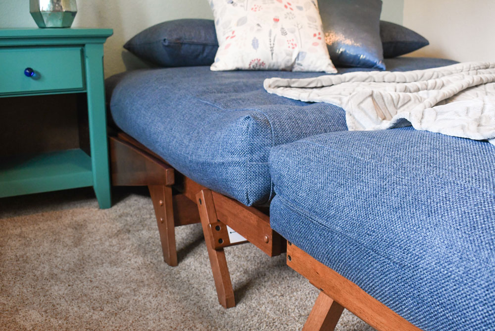 Easily convert this wall hugger futon from seating into a bed