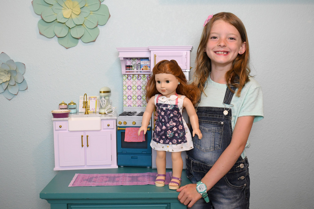 Play kitchen from American Girl with doll sized food and utensils