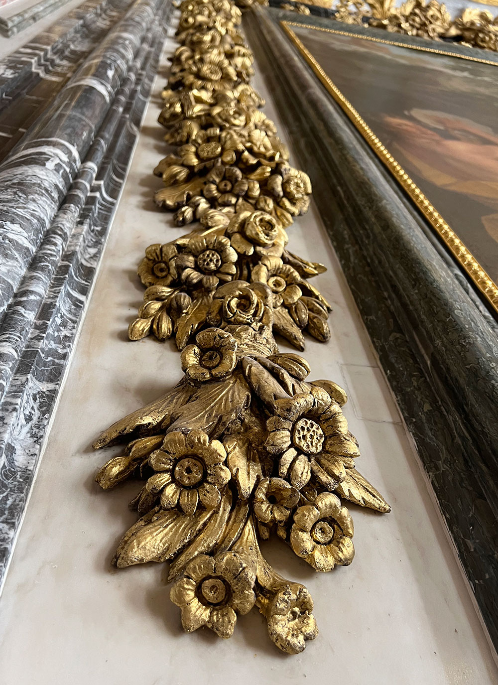 Palace of Versailles inside gold flower trim