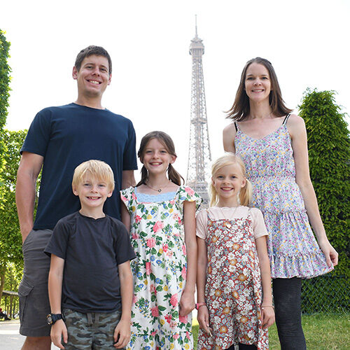 Wallace family in front of the Eiffel Tower in Paris