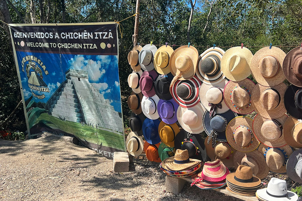 Chichen Itza Maya ruins entrance and hats for sale