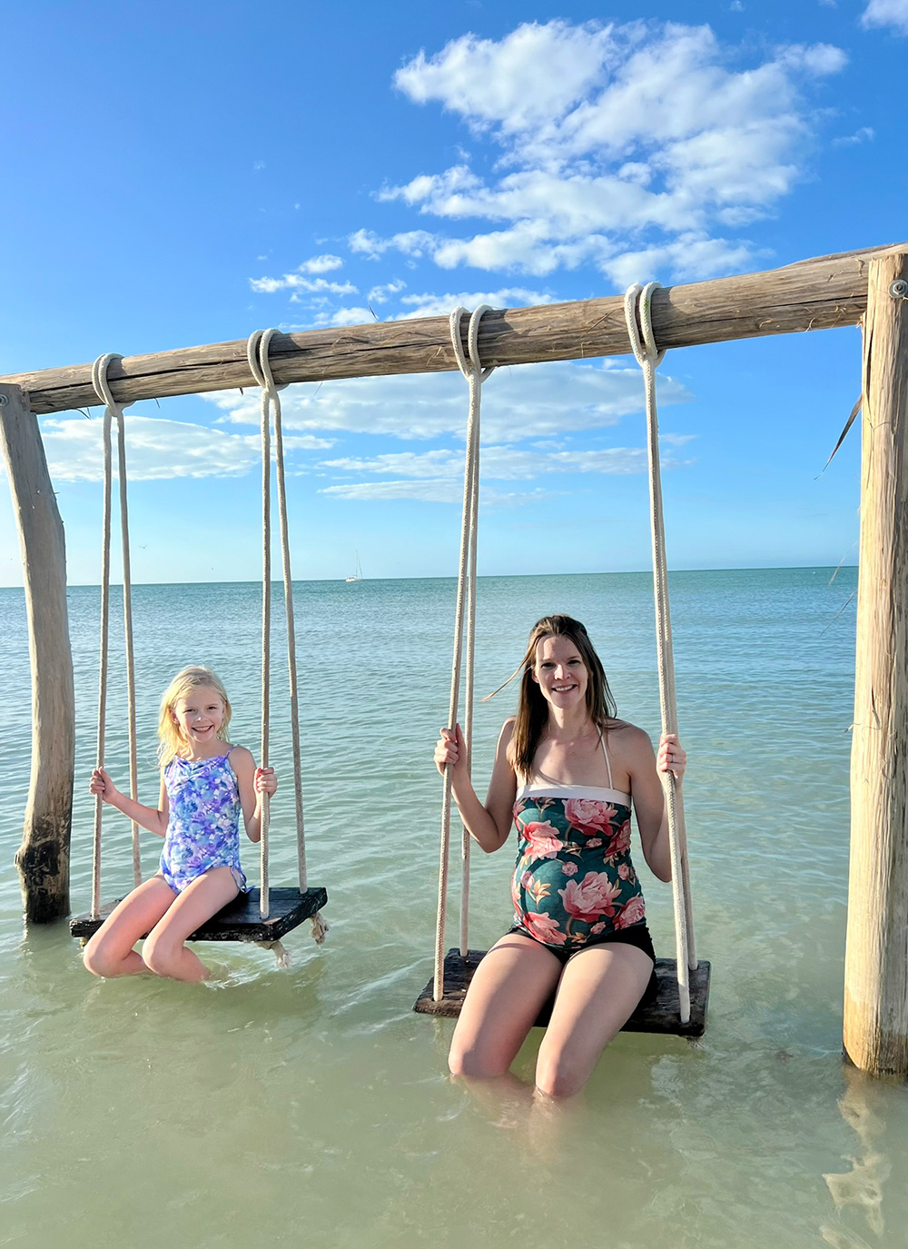mommy and girl beach swing in mexico