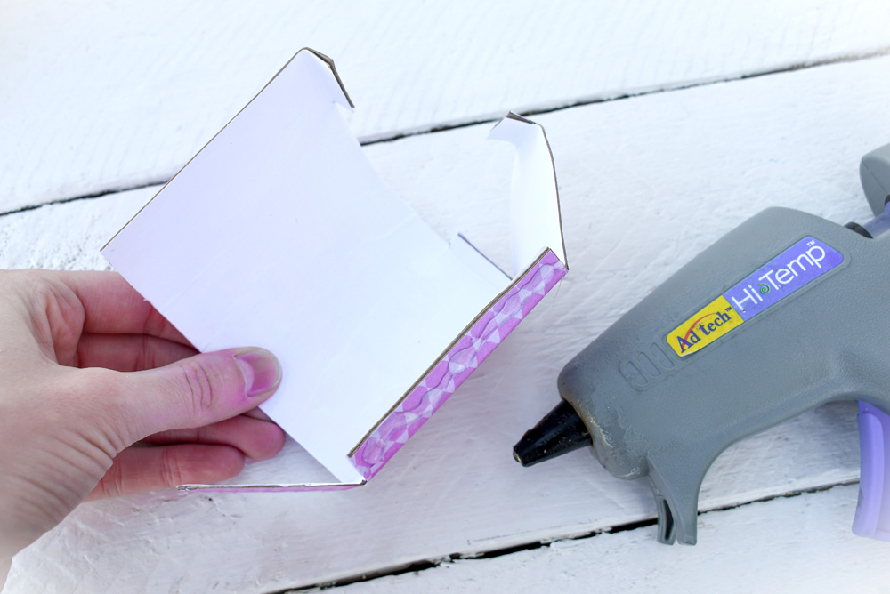 put together the doll mailbox using hot glue and the tabs