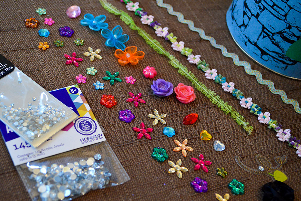 decorate your diy princess tower with rhinestones and flowers