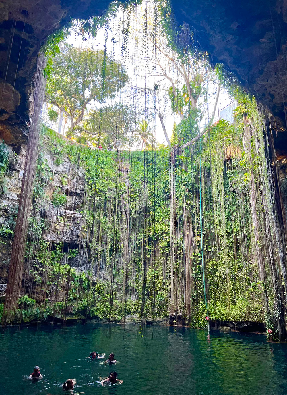 swimming in Cenote Ik Kil Yucatan with kids