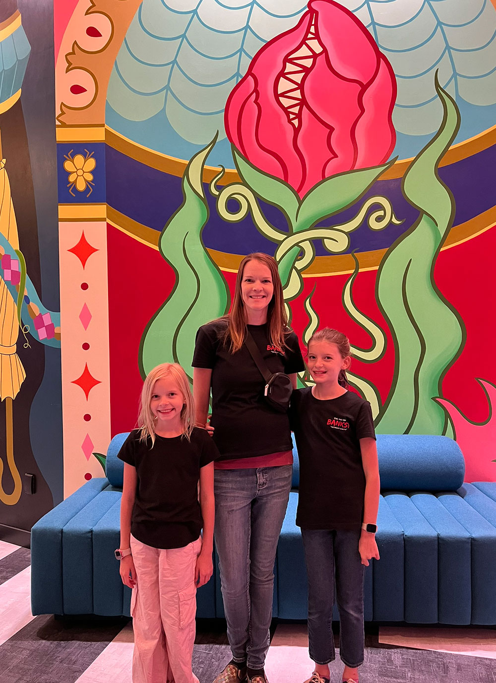 colorful alien fly trap mural at meow wolf visit with kids