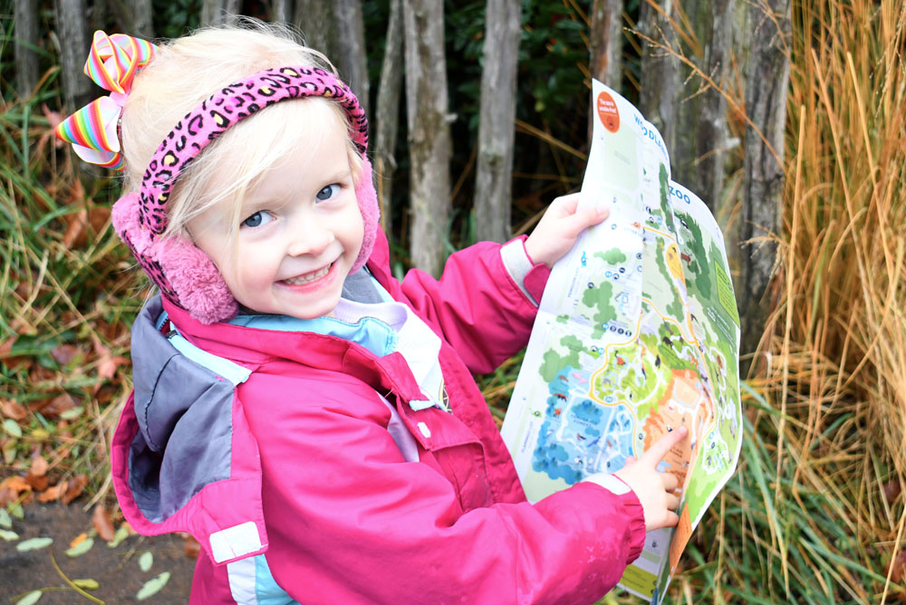 Seattle Woodland Park Zoo child holding a map