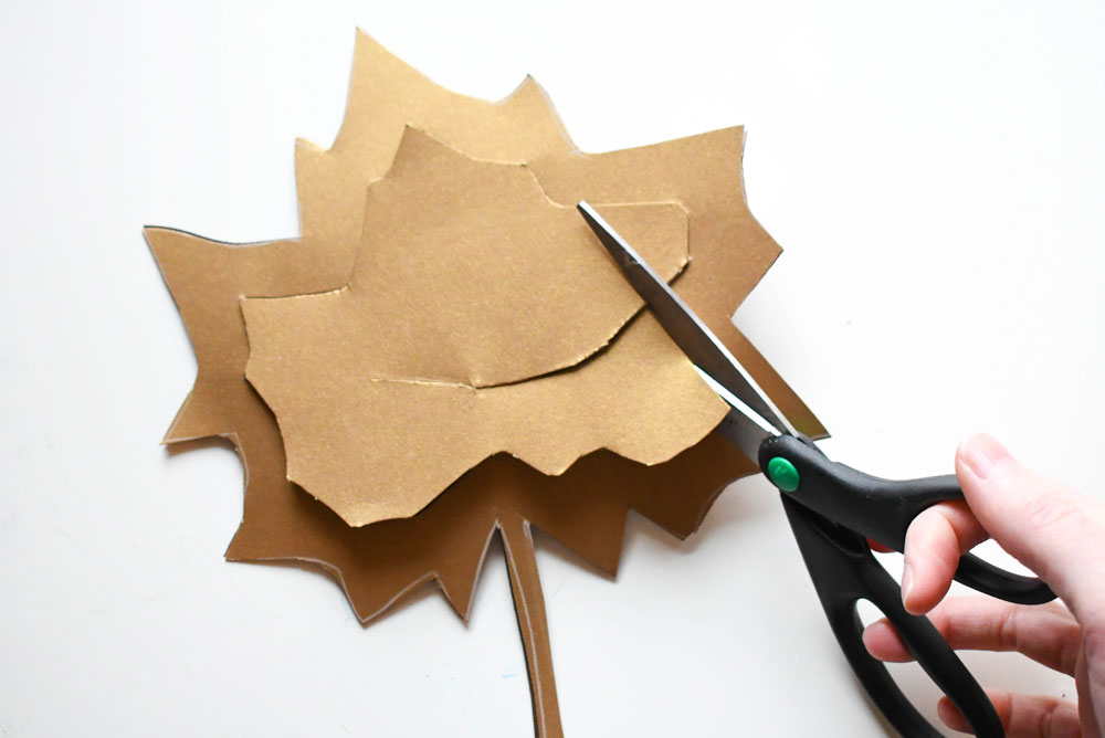 cut out the inner leaf shape to make a suncatcher