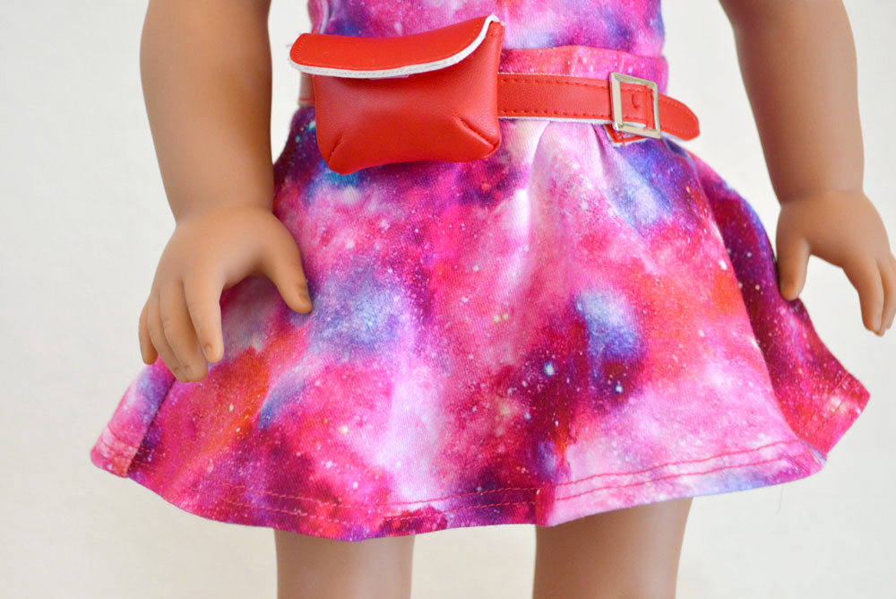 Luciana is ready for space camp dressed in her cosmic print dress